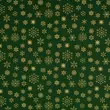 Karácsonyi pamutvászon arany hópelyhek zöld alapon