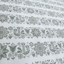 Pamutvászon fehér alapon szürke népi sorminta