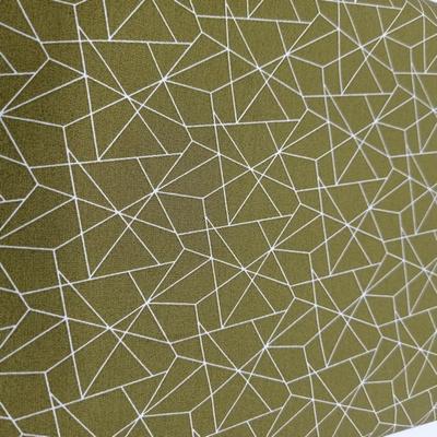 Pamutvászon olíva alapon fehér geometrikus minta