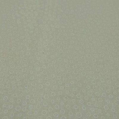 Pamutvászon fehér apró körök drapp alapon Pamutvászon fehér apró körök drapp alapon