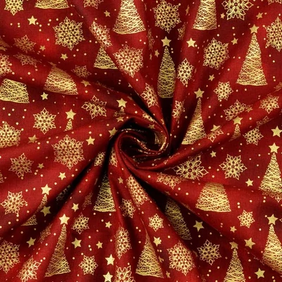 Karácsonyi pamutvászon piros batikolt alapon arany fenyők és hópelyhek