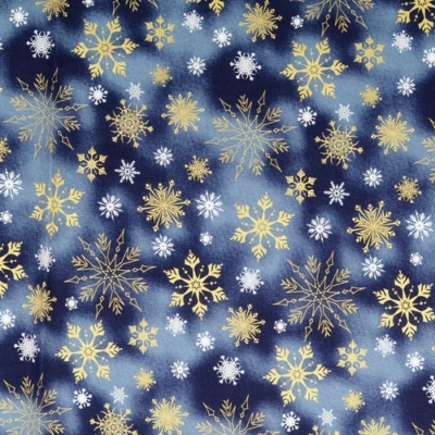 Karácsonyi pamutvászon batikolt hatású kék alapon arany hópihék