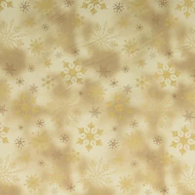 Karácsonyi pamutvászon batikolt hatású krém alapon arany hópihék