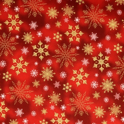 Karácsonyi pamutvászon batikolt hatású piros alapon arany hópihék