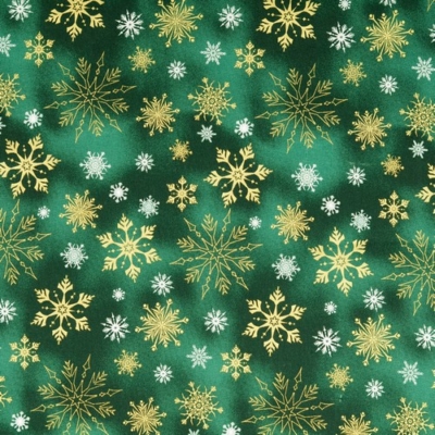 Karácsonyi pamutvászon batikolt hatású zöld alapon arany hópihék